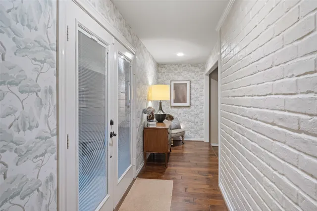 a bathroom with a sink and mirror