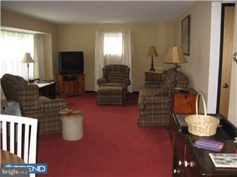 967 Chesterfield Road Haddonfield, NJ 08033 - Photo 3 of 7 a living room with furniture and a flat screen tv