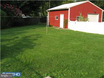 967 Chesterfield Road Haddonfield, NJ 08033 - Photo 6 of 7 a view of backyard with potted plants and a park