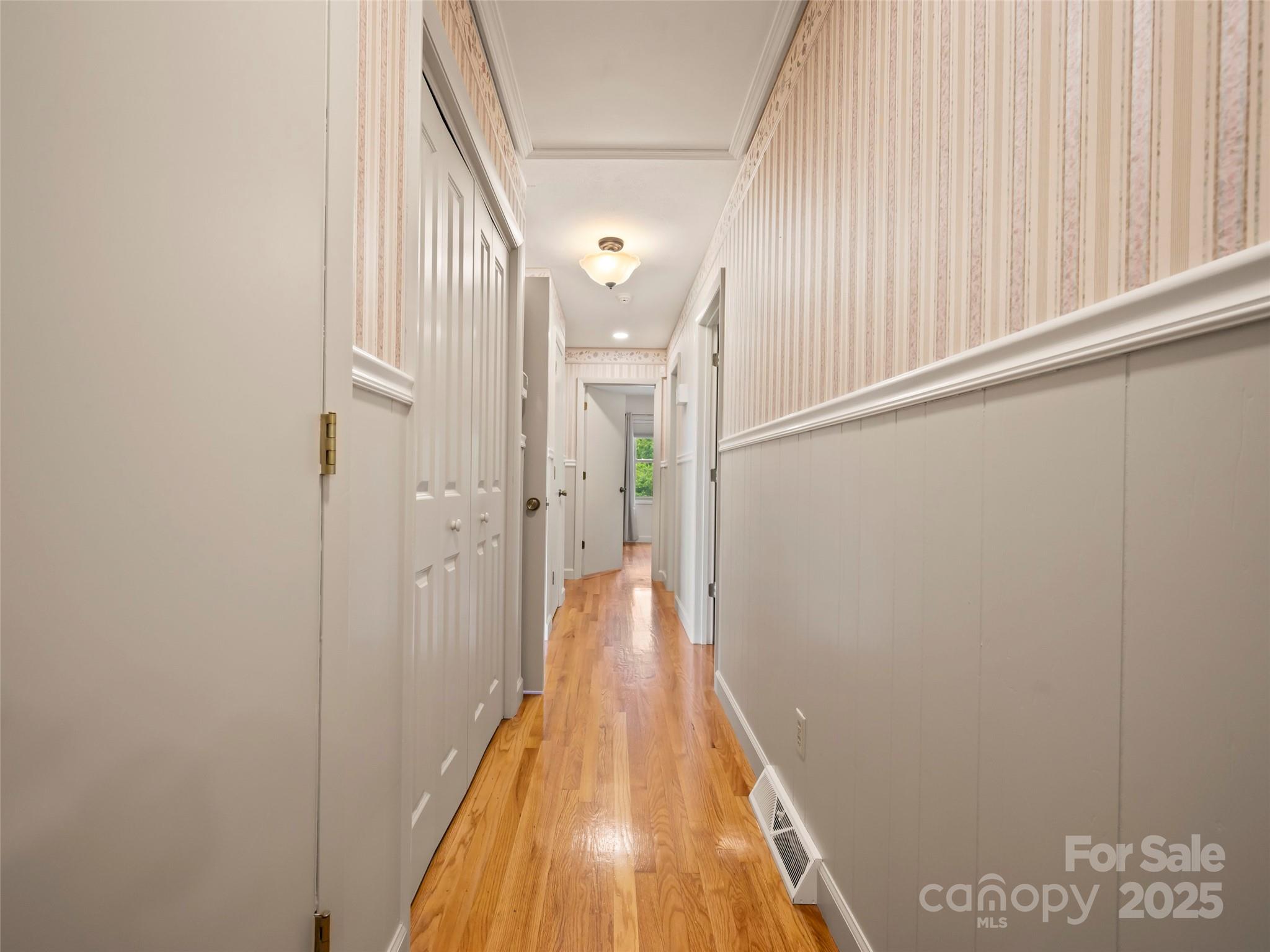 418 Mountain Page Road Saluda, NC 28773 - Photo 24 of 48 a view of a hallway with wooden floor and staircase