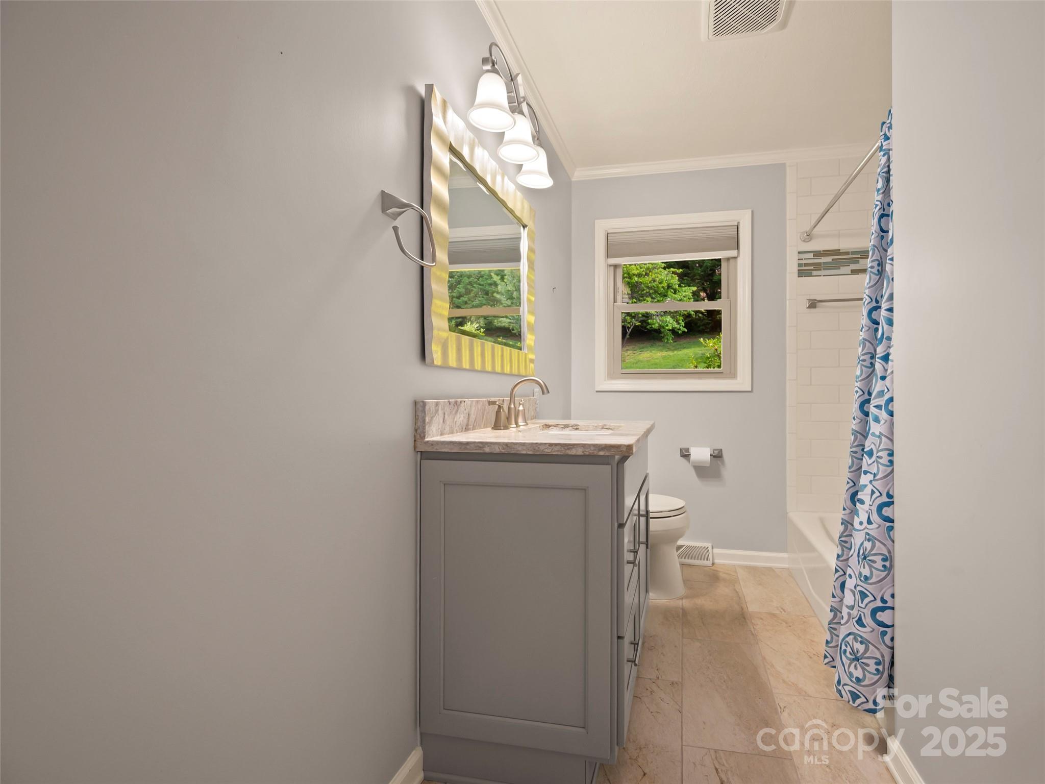 418 Mountain Page Road Saluda, NC 28773 - Photo 28 of 48 a bathroom with a sink and a bathtub