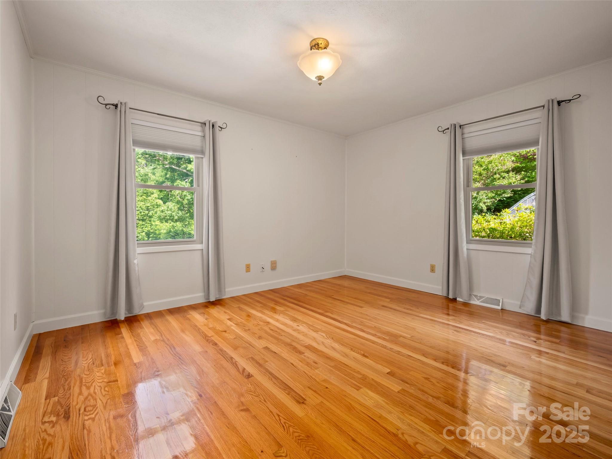 418 Mountain Page Road Saluda, NC 28773 - Photo 29 of 48 a view of an empty room with a window