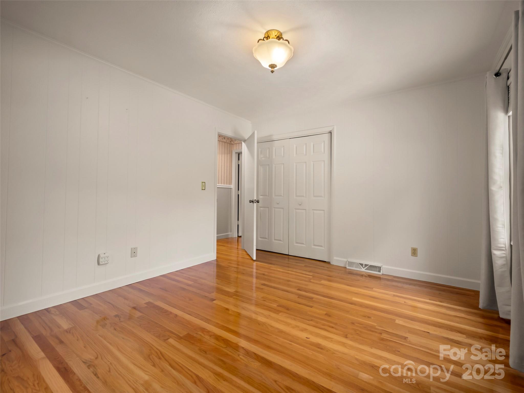 418 Mountain Page Road Saluda, NC 28773 - Photo 30 of 48 wooden floor in an empty room