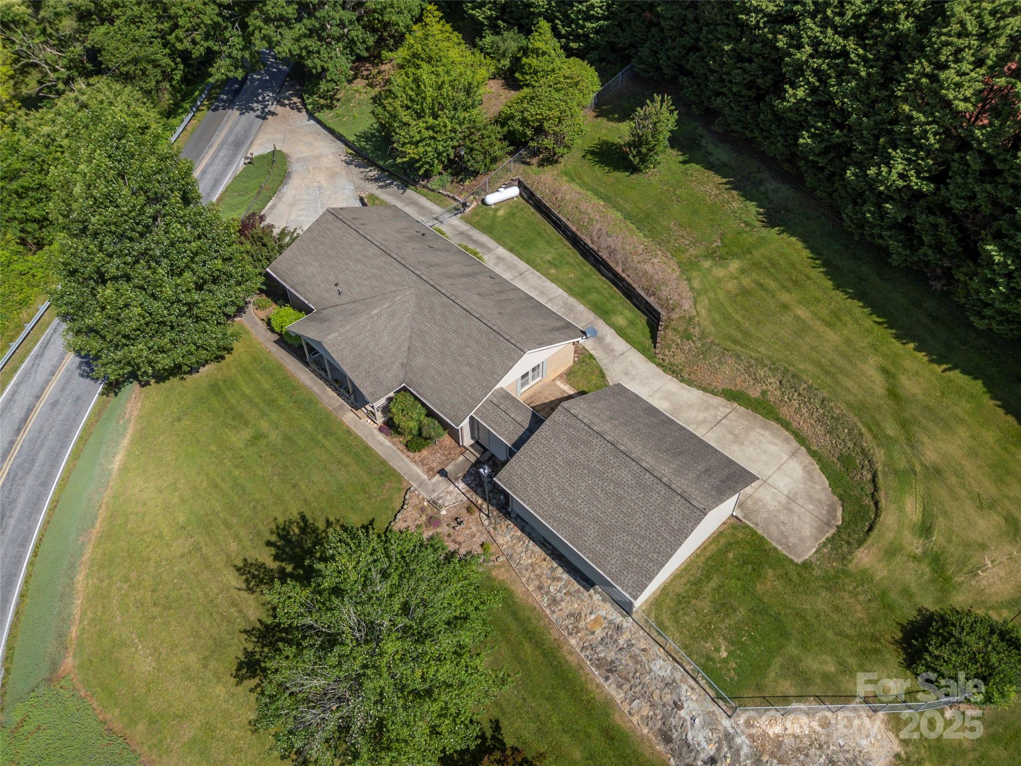 418 Mountain Page Road Saluda, NC 28773 - Photo 46 of 48 an aerial view of a house