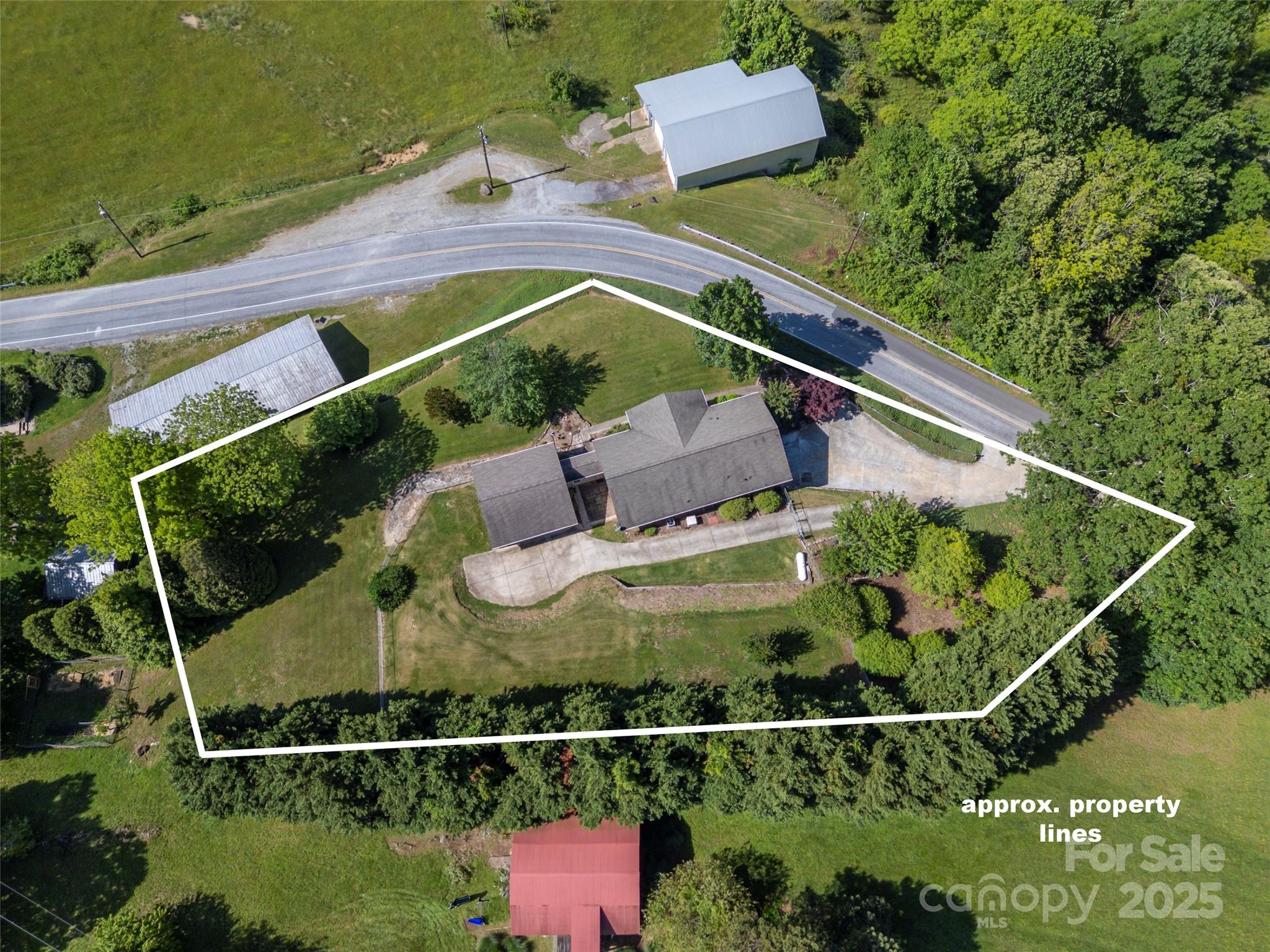 418 Mountain Page Road Saluda, NC 28773 - Photo 47 of 48 an aerial view of a house