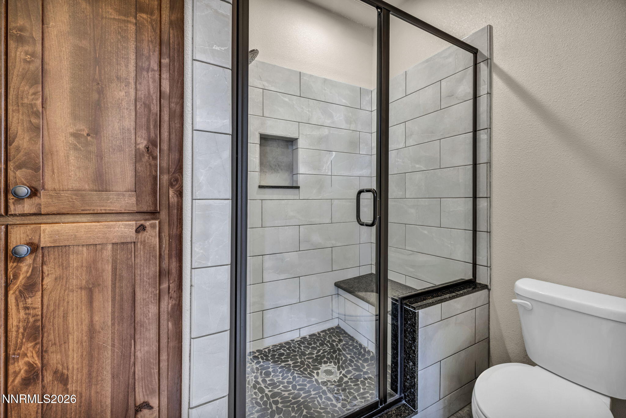 1286 Sky Ridge Drive Fallon, NV 89406 - Photo 25 of 49 a bathroom with a toilet and a shower