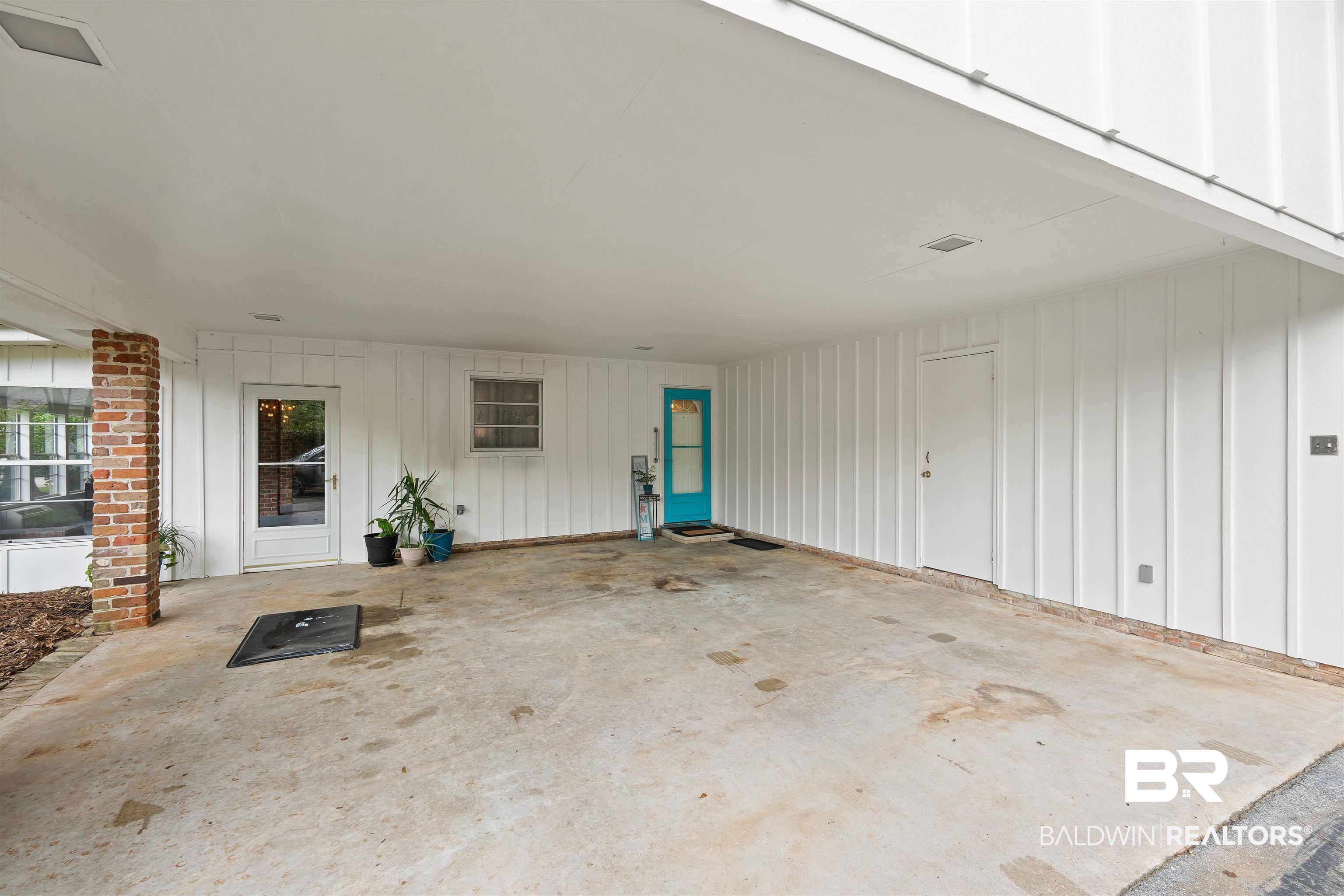 4051 East Canal Circle Mobile, AL 36619 - Photo 27 of 32 Double carport with storage room/workshop