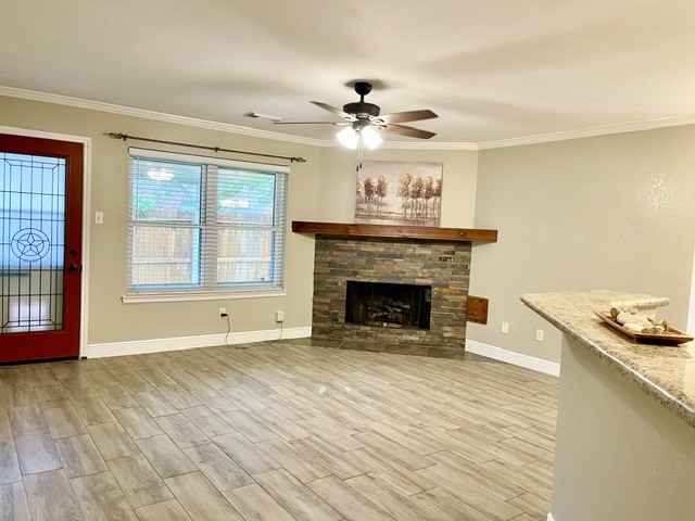 13506 Spring Court Tomball, TX 77375 - Photo 4 of 37 a view of an empty room with a fireplace and a window