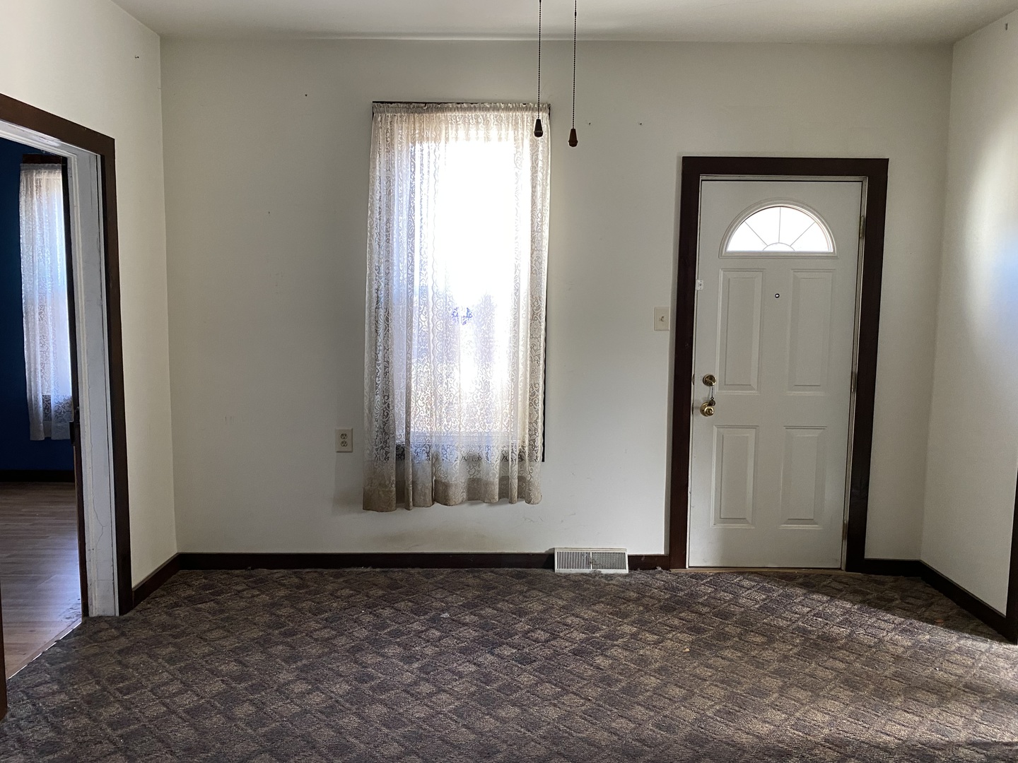 1663 East 7th Road Lostant, IL 61334 - Photo 2 of 16 an empty room with windows and closet