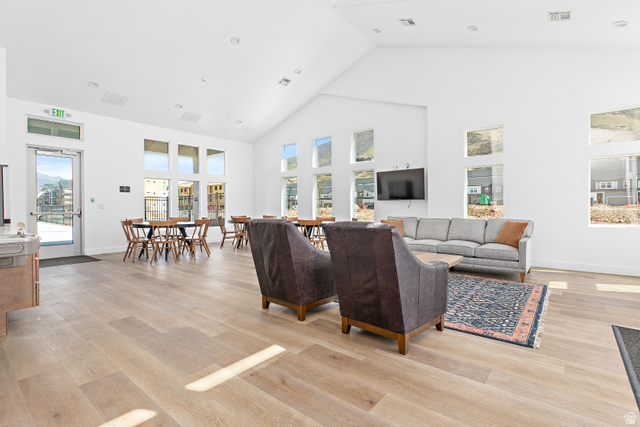 4735 Alder Drive, Unit F101 Mapleton, UT 84664 - Photo 25 of 30 Living room featuring light wood-style floors, lofted ceiling, and recessed lighting