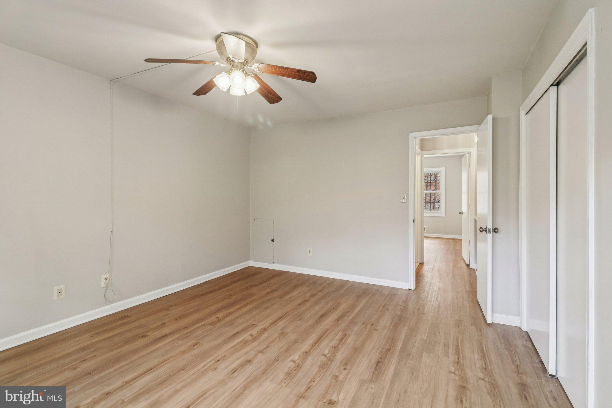 5912 Minutemen Road, Unit 295 Springfield, VA 22152 - Photo 32 of 55 a view of empty room with wooden floor