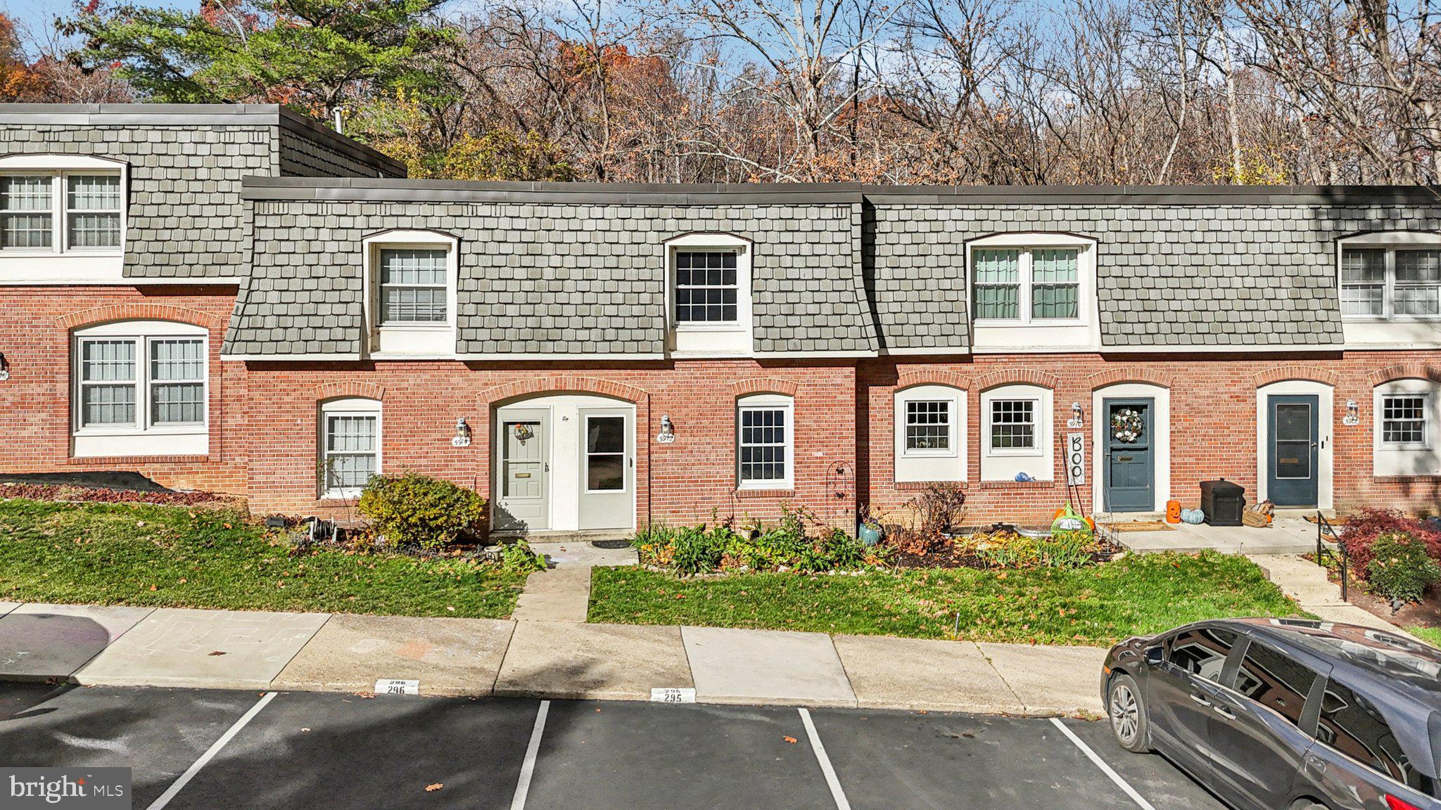 5912 Minutemen Road, Unit 295 Springfield, VA 22152 - Photo 45 of 55 front view of a house with a yard