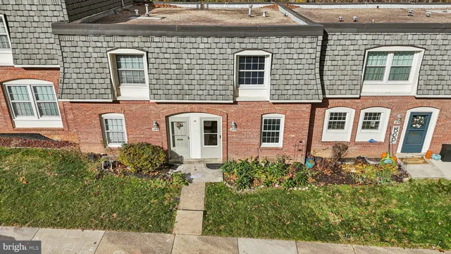 a picture of a bench in front of a door