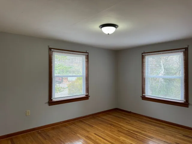 an empty room with windows