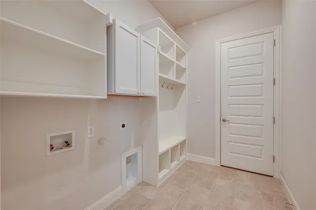 a view of a porch with furniture and a yard