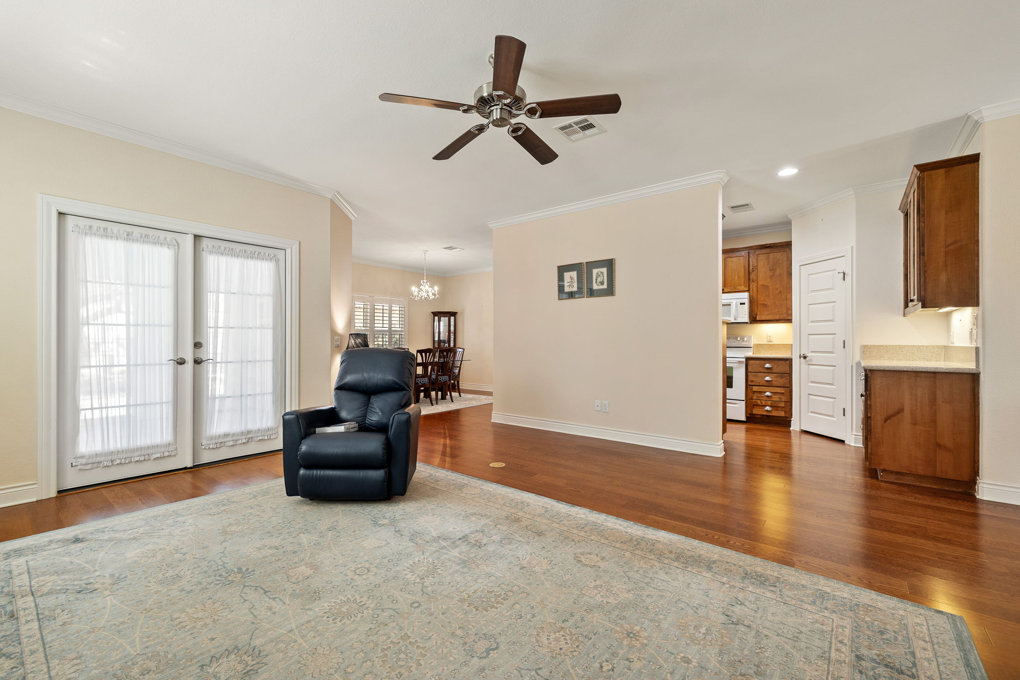 5201 Big Spring Street Georgetown, TX 78633 - Photo 8 of 26 a living room with furniture and a wooden floor
