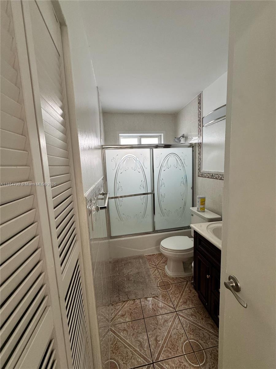 1671 Southwest 29th Avenue Miami, FL 33145 - Photo 15 of 21 a bathroom with a toilet and a shower