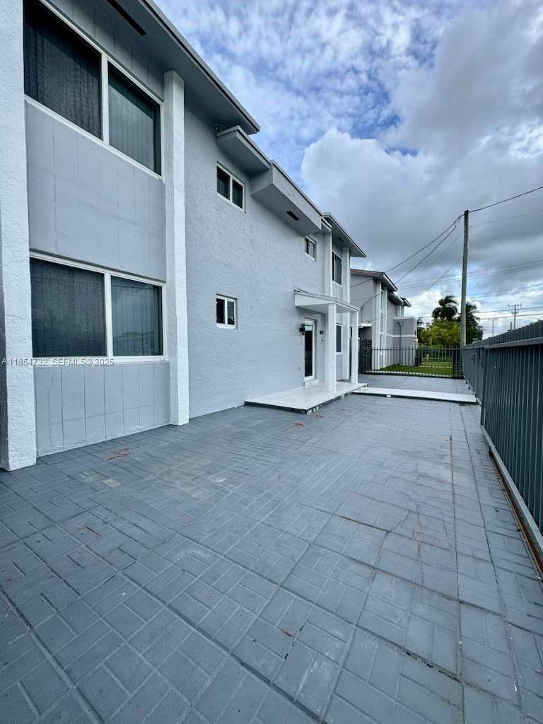 1671 Southwest 29th Avenue Miami, FL 33145 - Photo 3 of 21 a view of a house with a street