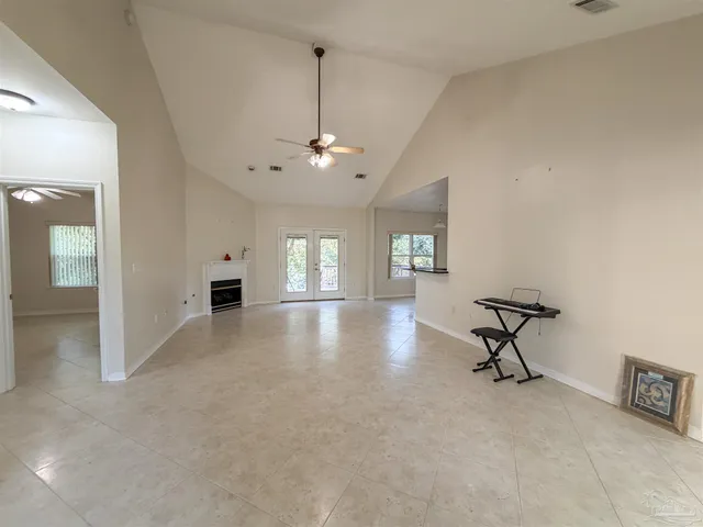 a view of a livingroom with a staircase