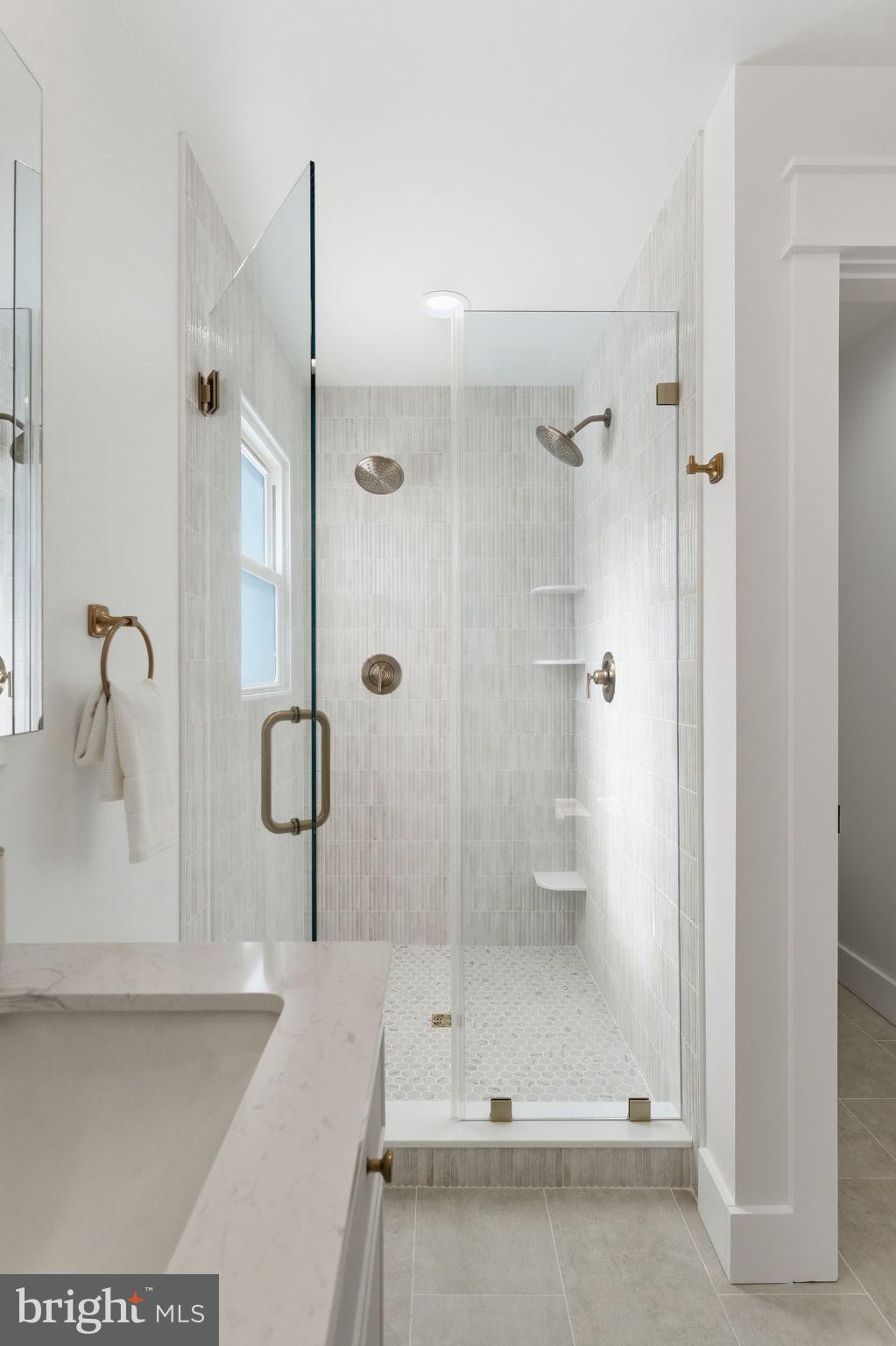 8615 Kerry Lane Springfield, VA 22152 - Photo 17 of 50 a bathroom with a shower and a sink