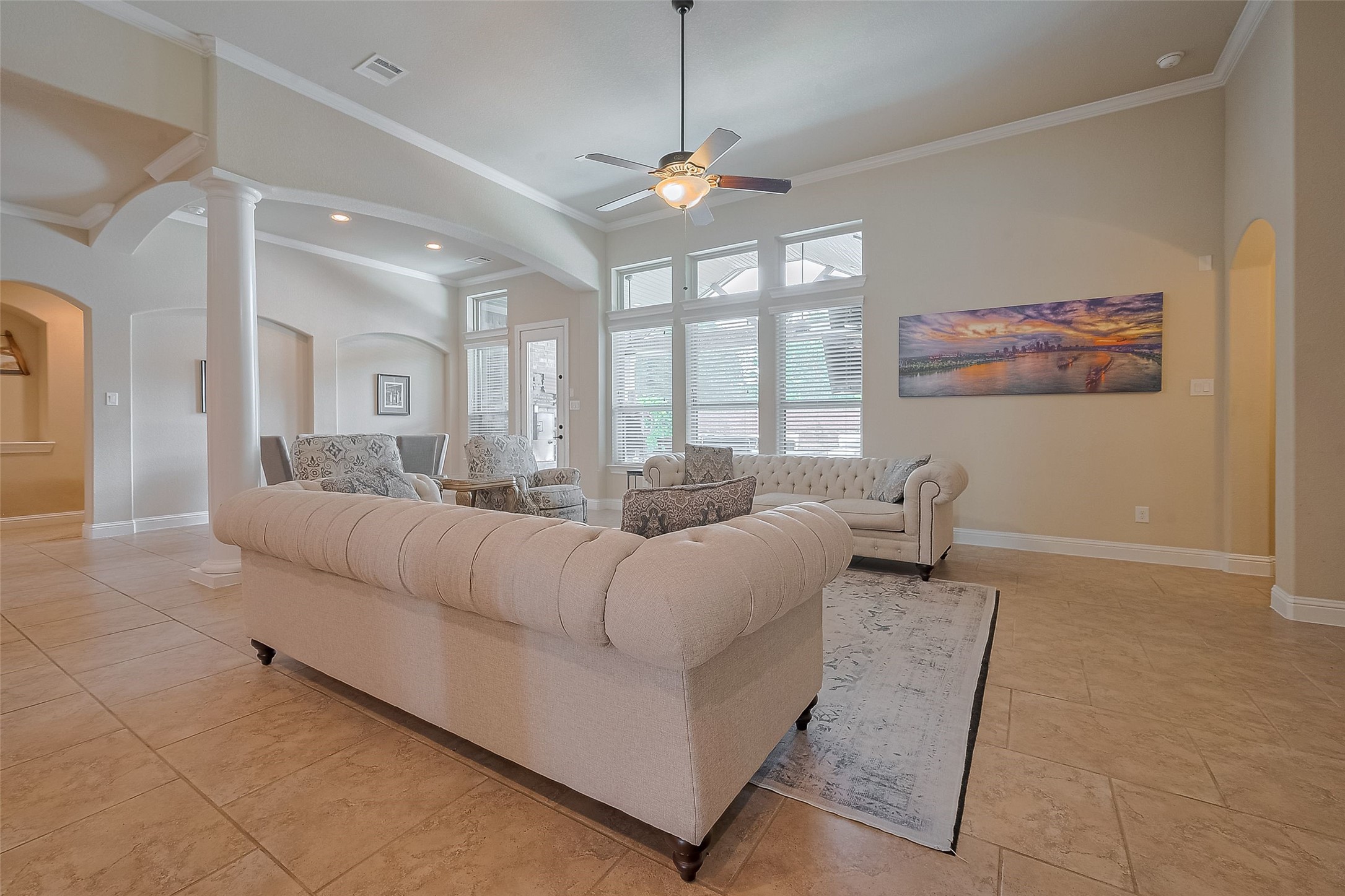 28210 Green Forest Bluff Trail Katy, TX 77494 - Photo 8 of 32 Natural light feels the living room area and provides great views of the pool