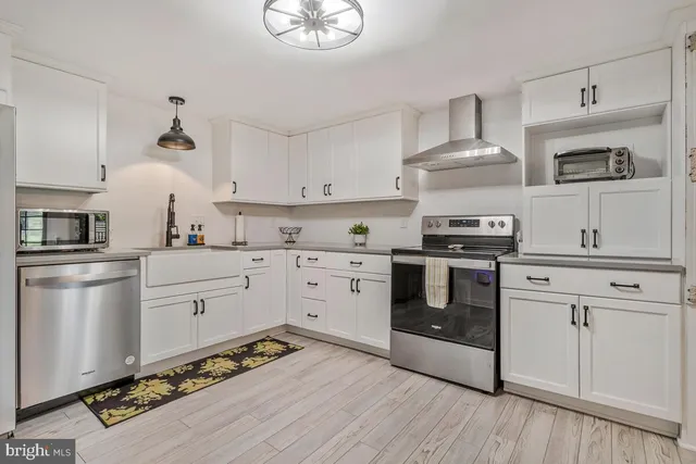 a view of a livingroom with furniture and window