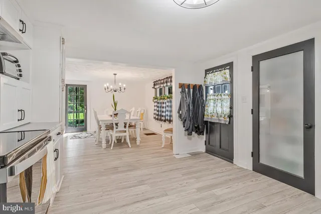 a work room with furniture and windows