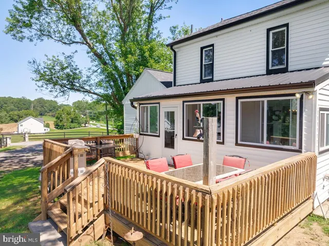 a view of a garden with an outdoor space
