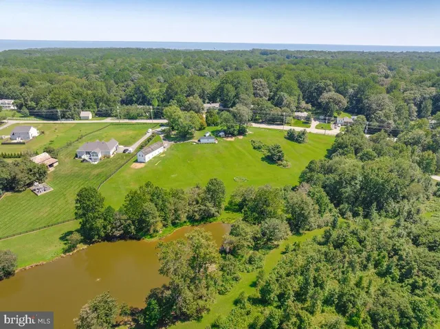 a view of a swimming pool with a lake view