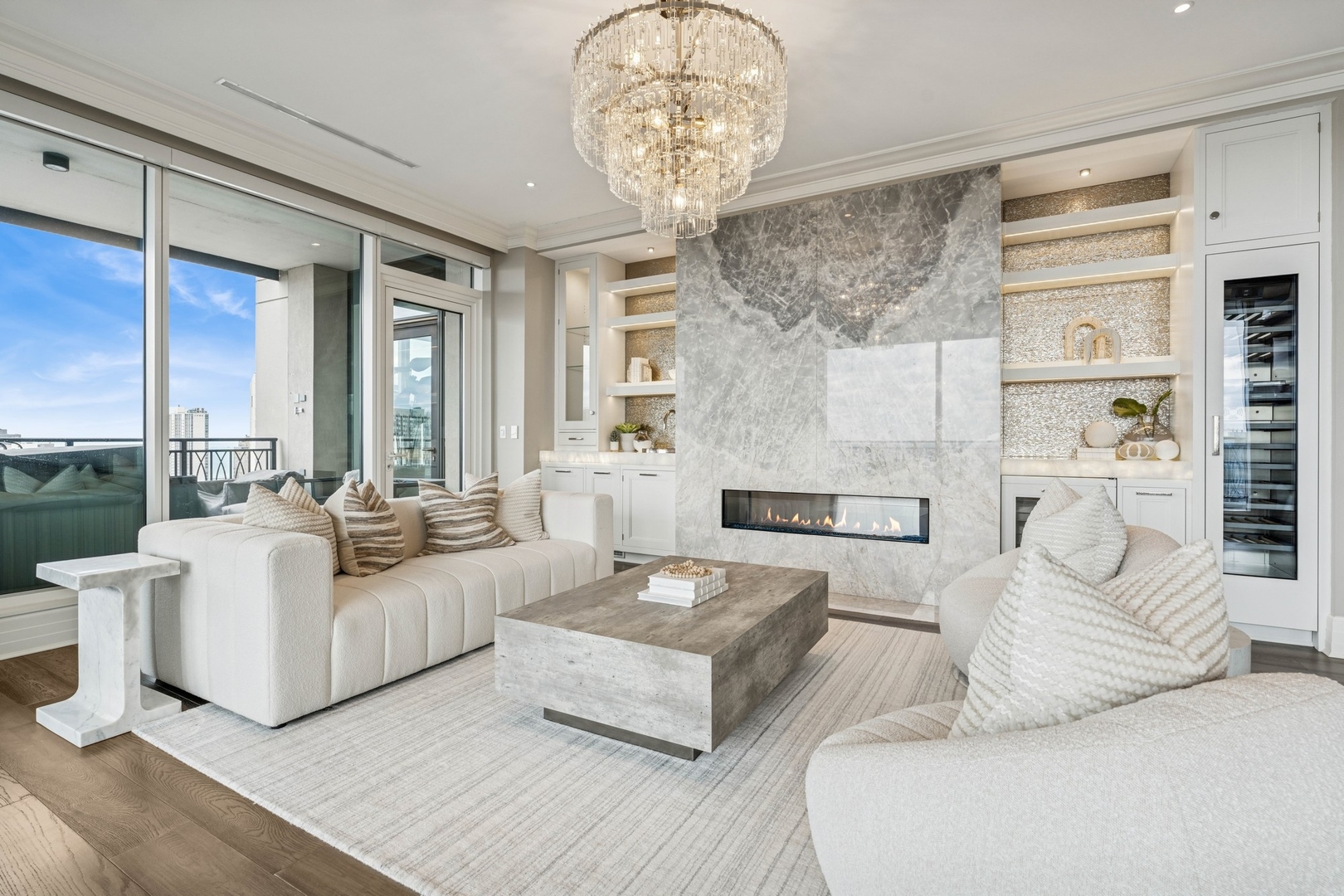 9 West Walton Street, Unit 2802 Chicago, IL 60610 - Photo 6 of 44 a living room with furniture and a chandelier