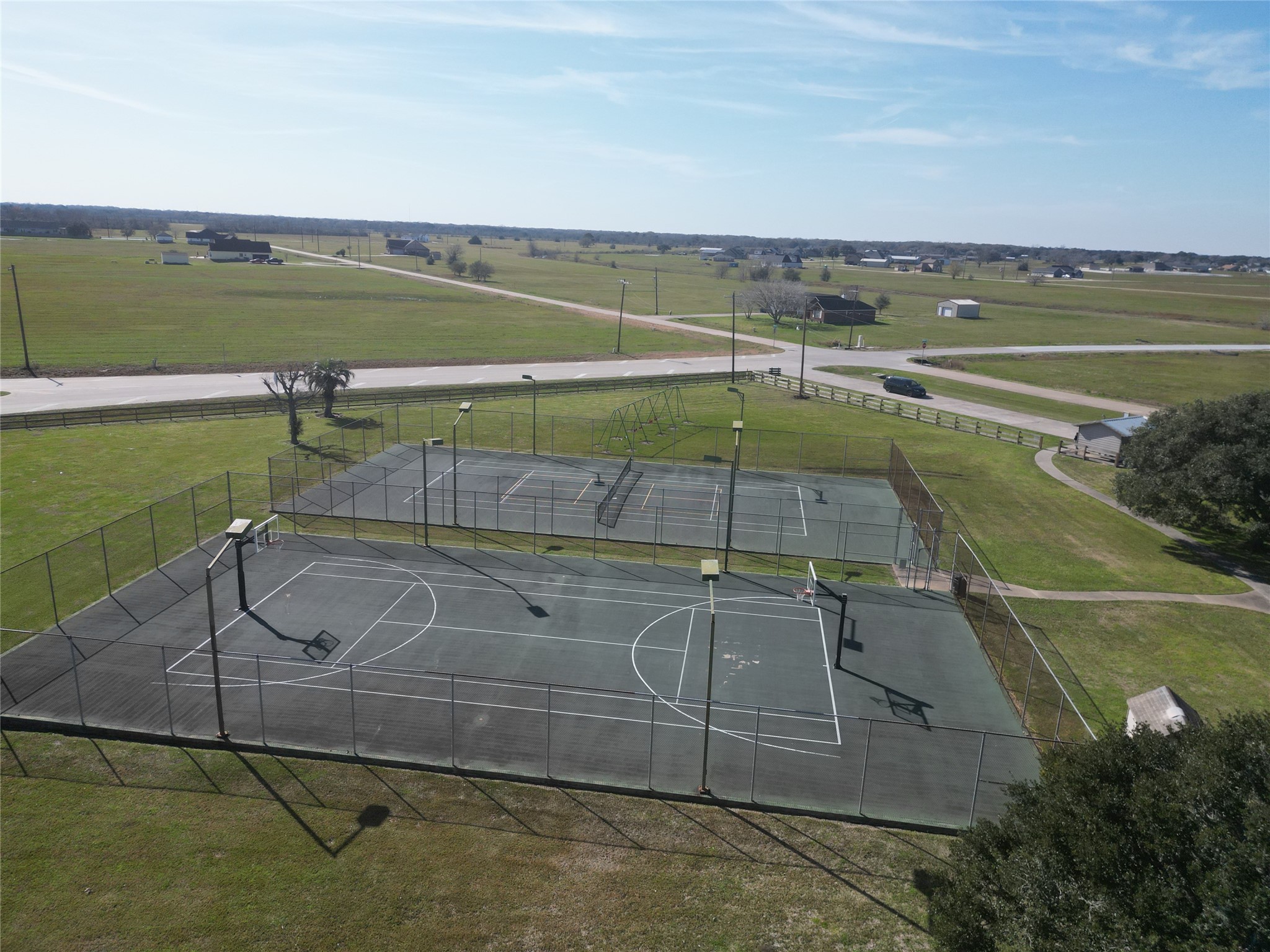 497 Brahman Trail Angleton, TX 77515 - Photo 11 of 15 a view of a tennis court