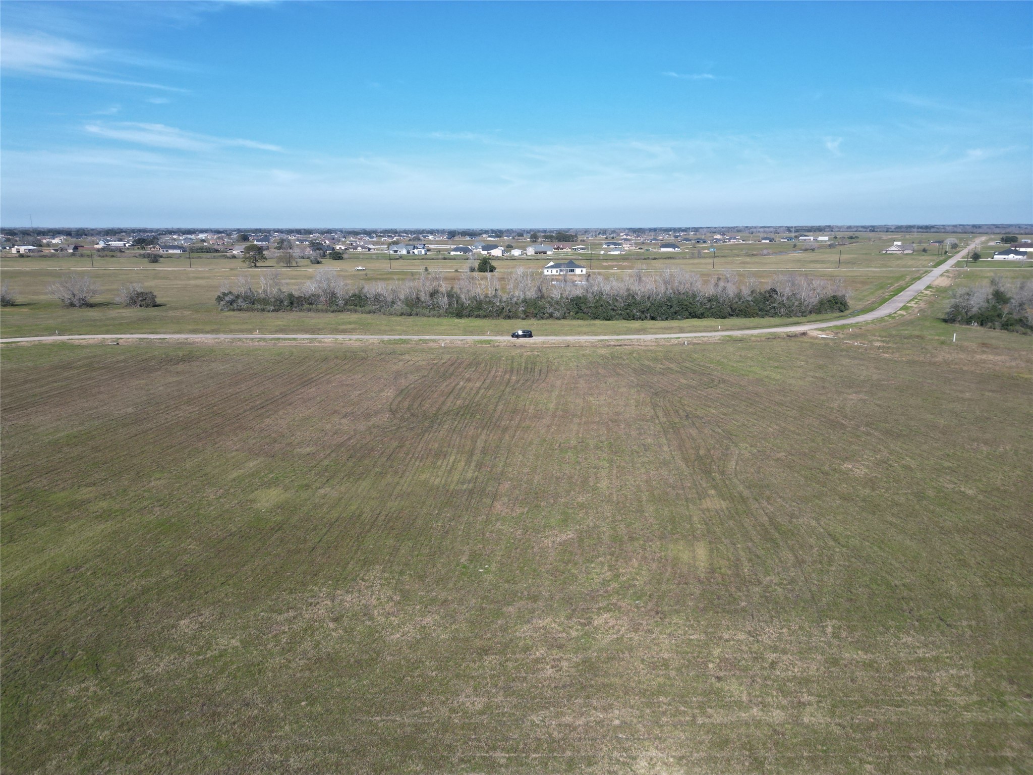 497 Brahman Trail Angleton, TX 77515 - Photo 10 of 15 a view of a lake view and mountain