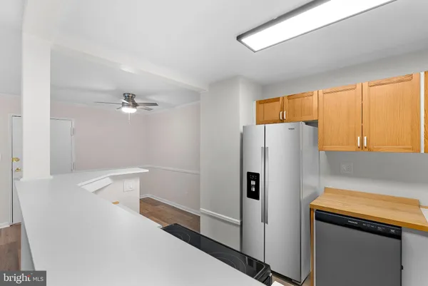 a kitchen with a stove and a microwave