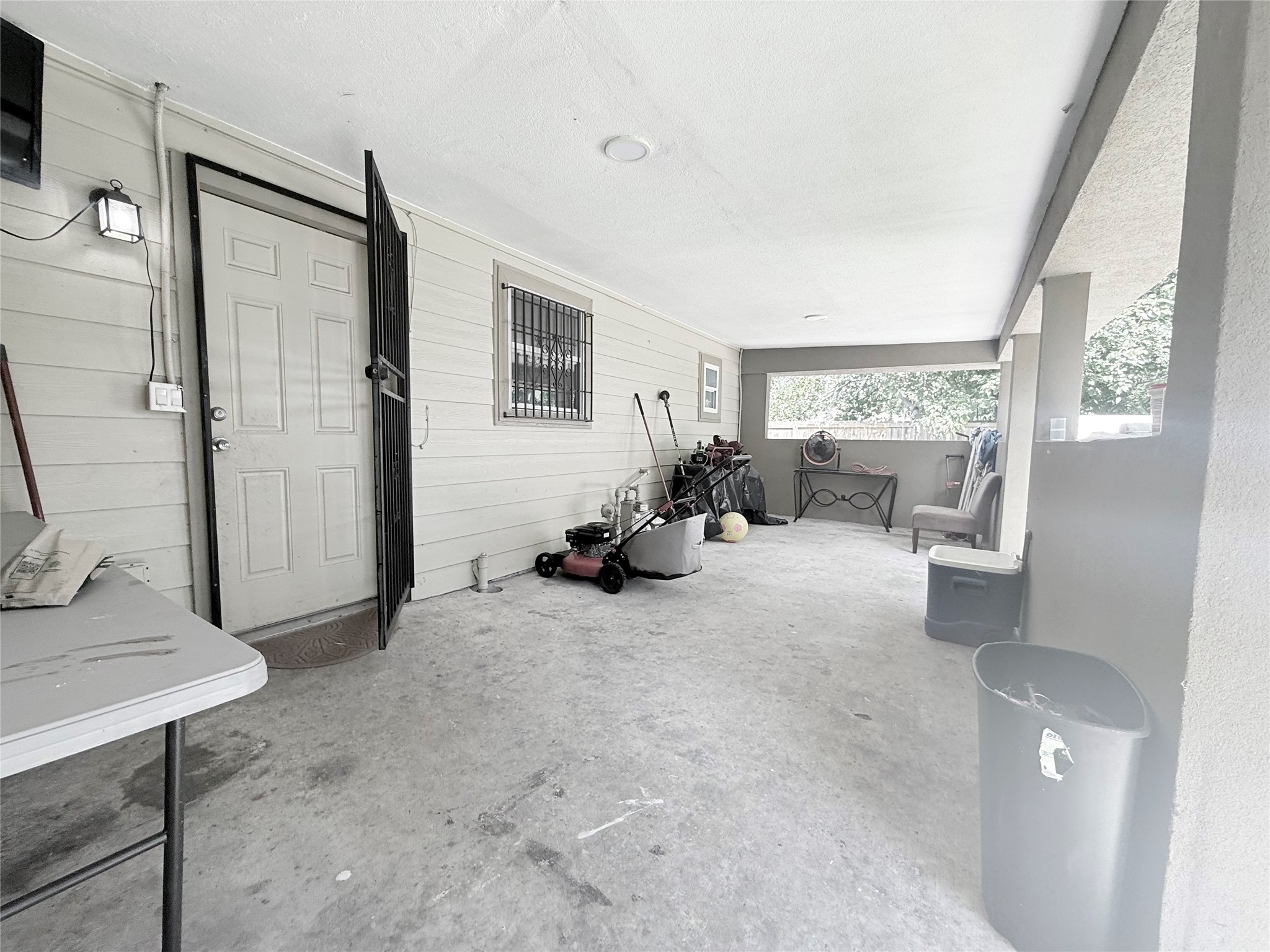 5103 Northridge Drive Houston, TX 77033 - Photo 16 of 39 a living room with furniture and a large window