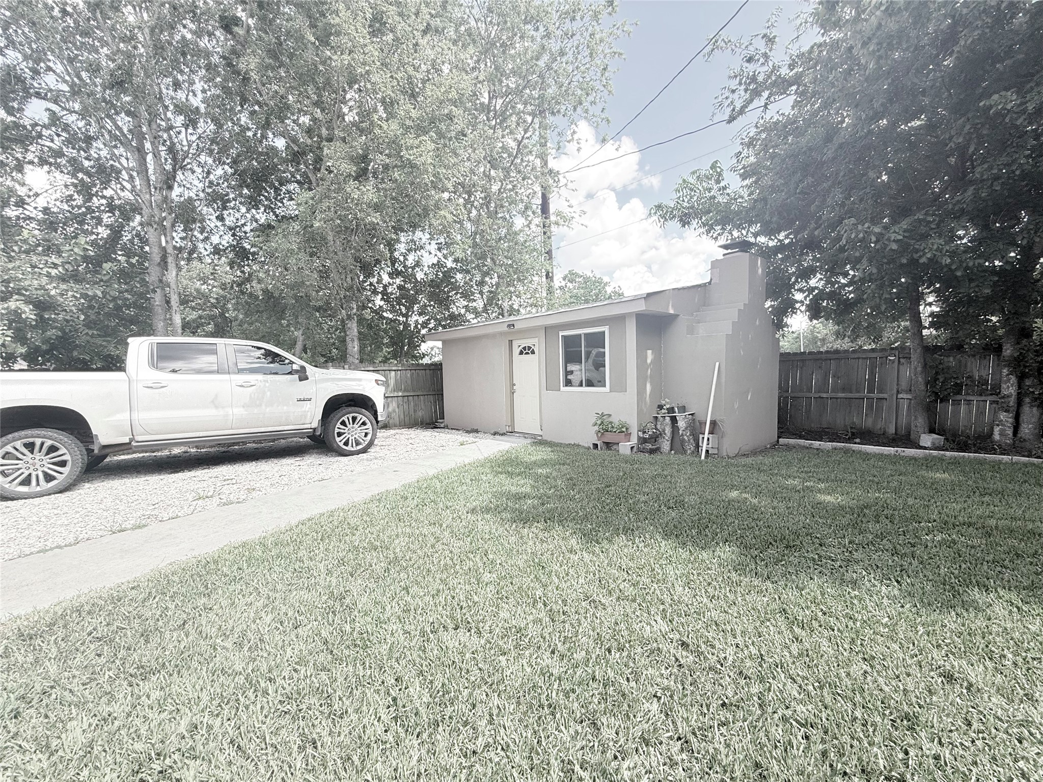 5103 Northridge Drive Houston, TX 77033 - Photo 19 of 39 a car parked in front of white house