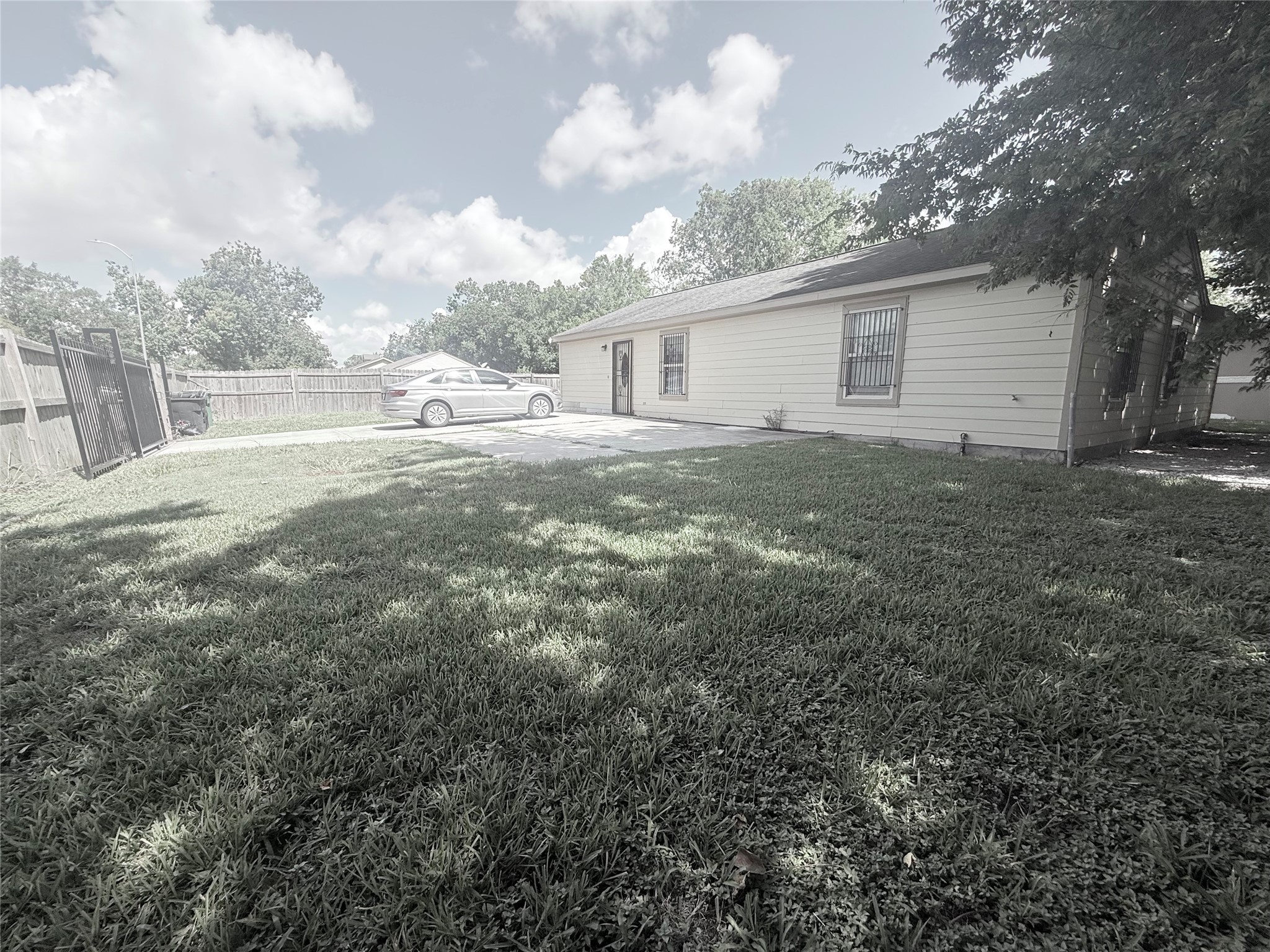 5103 Northridge Drive Houston, TX 77033 - Photo 4 of 39 a view of backyard of house and trees