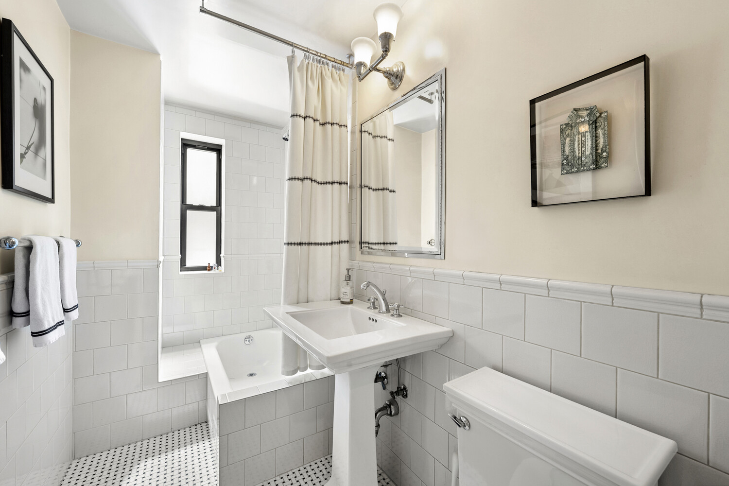 25 East 86th Street, Unit 4B Manhattan, NY 10028 - Photo 5 of 16 a bathroom with a sink toilet and mirror