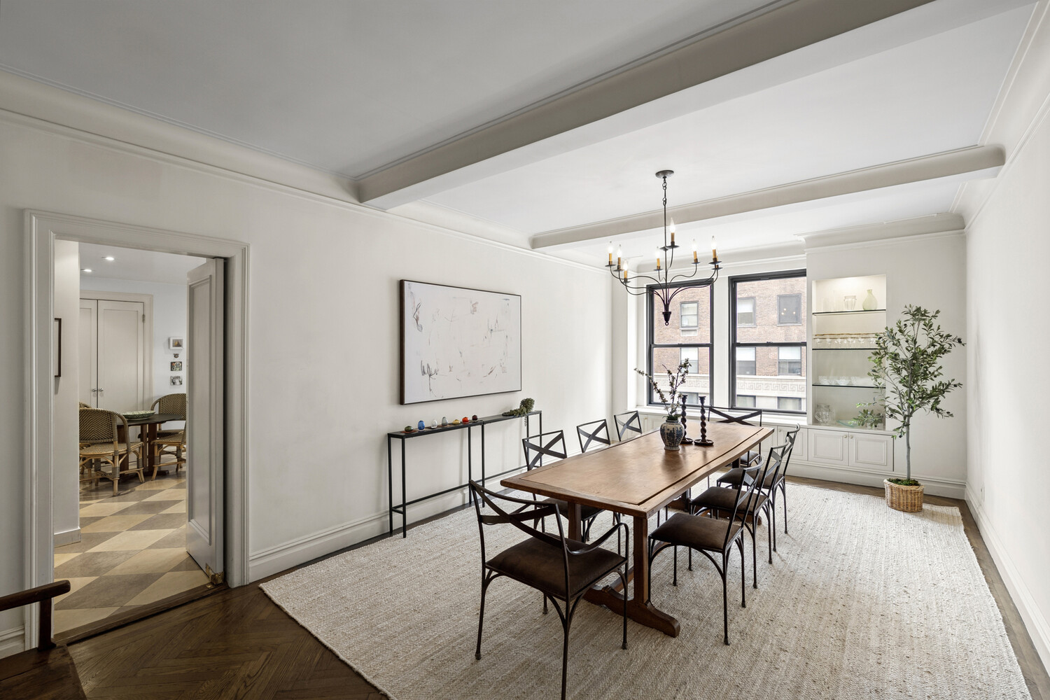 25 East 86th Street, Unit 4B Manhattan, NY 10028 - Photo 8 of 16 a view of a dining room with furniture and wooden floor