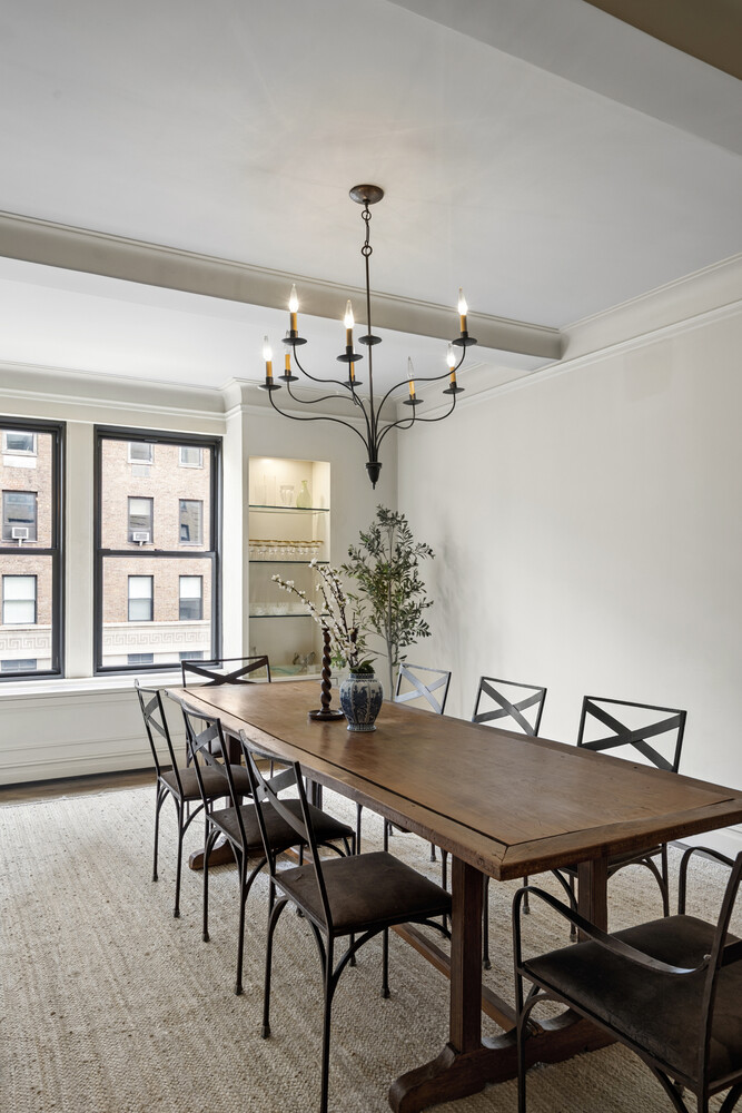 25 East 86th Street, Unit 4B Manhattan, NY 10028 - Photo 9 of 16 a view of a dining room with furniture and window