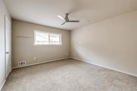a bathroom with a sink a large mirror and a bathtub