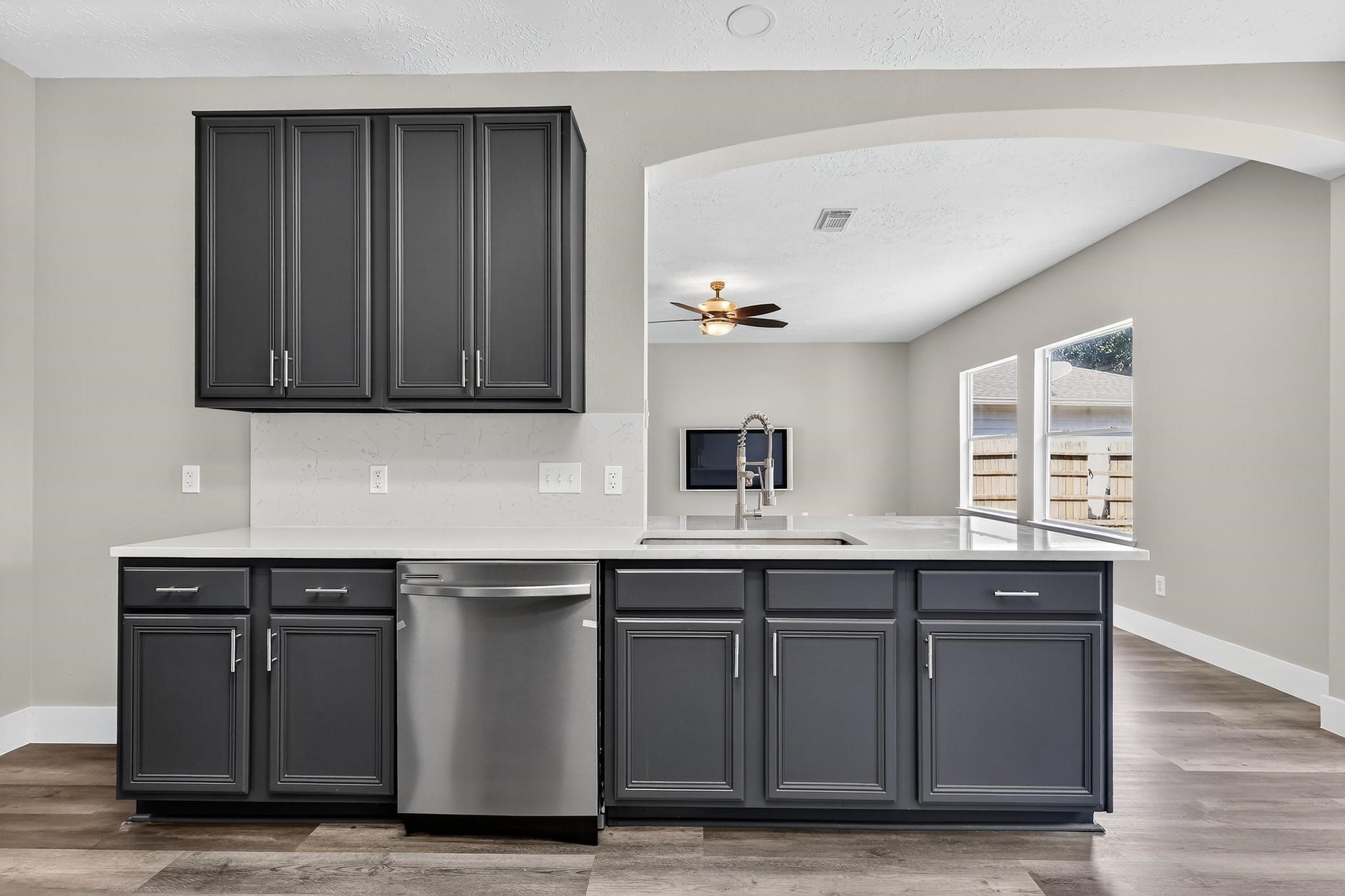 20926 Trellis Lane Houston, TX 77073 - Photo 14 of 24 a kitchen with a sink and cabinets