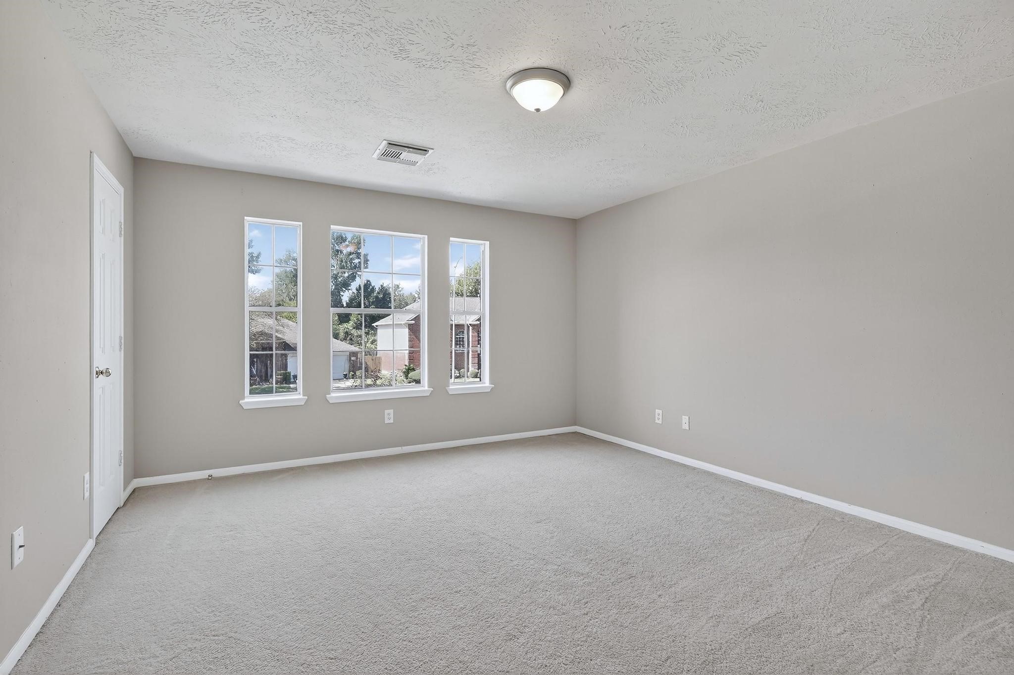 20926 Trellis Lane Houston, TX 77073 - Photo 20 of 24 a view of an empty room with a window