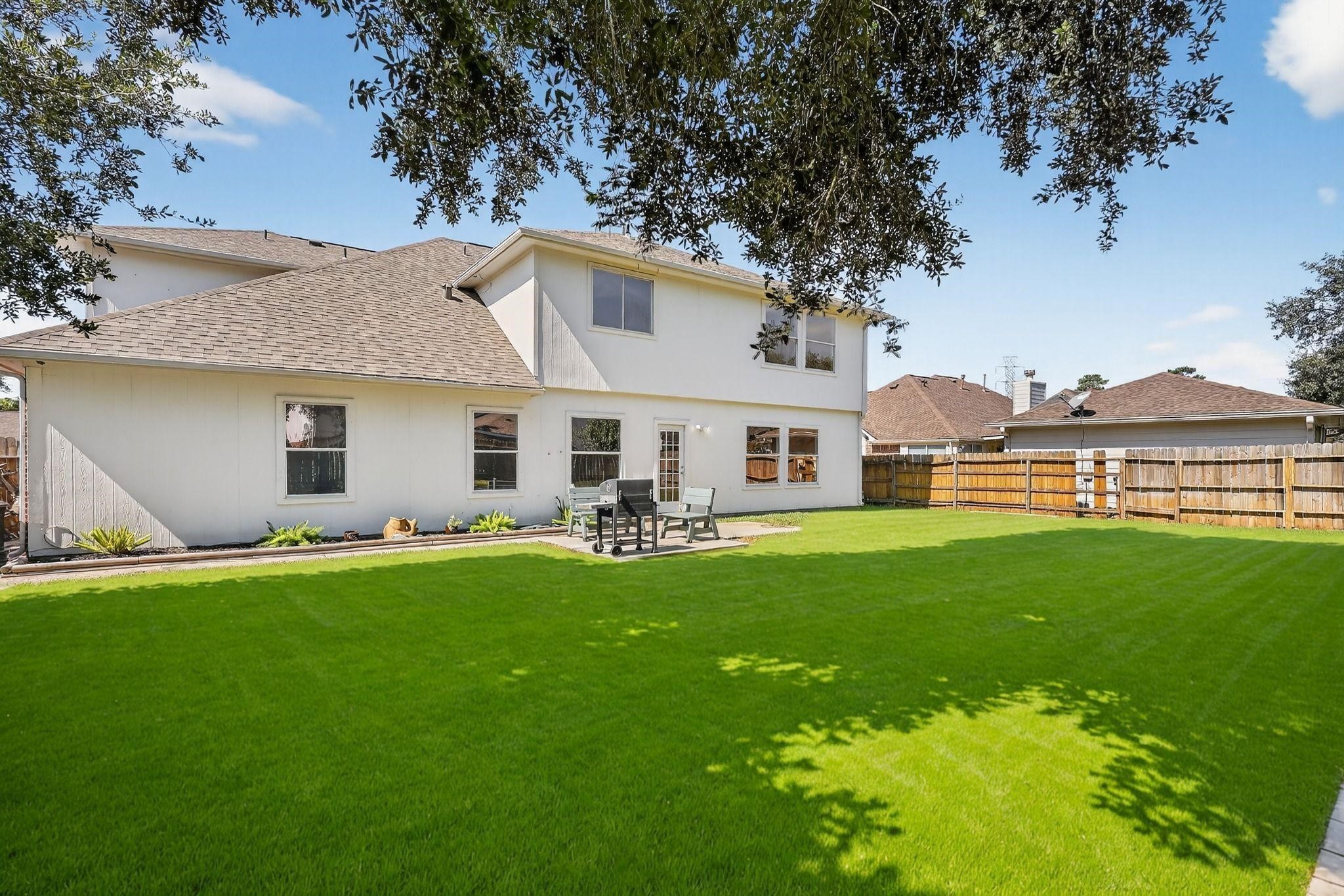 20926 Trellis Lane Houston, TX 77073 - Photo 24 of 24 a front view of a house with a garden