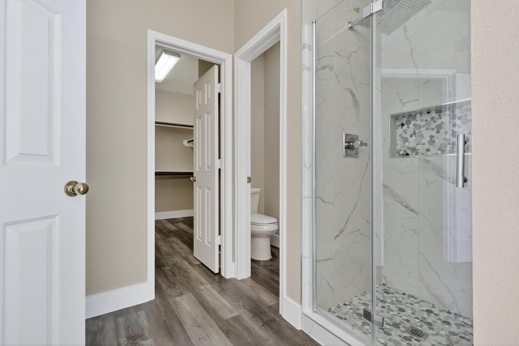 20926 Trellis Lane Houston, TX 77073 - Photo 10 of 24 a bathroom with a shower and a glass door