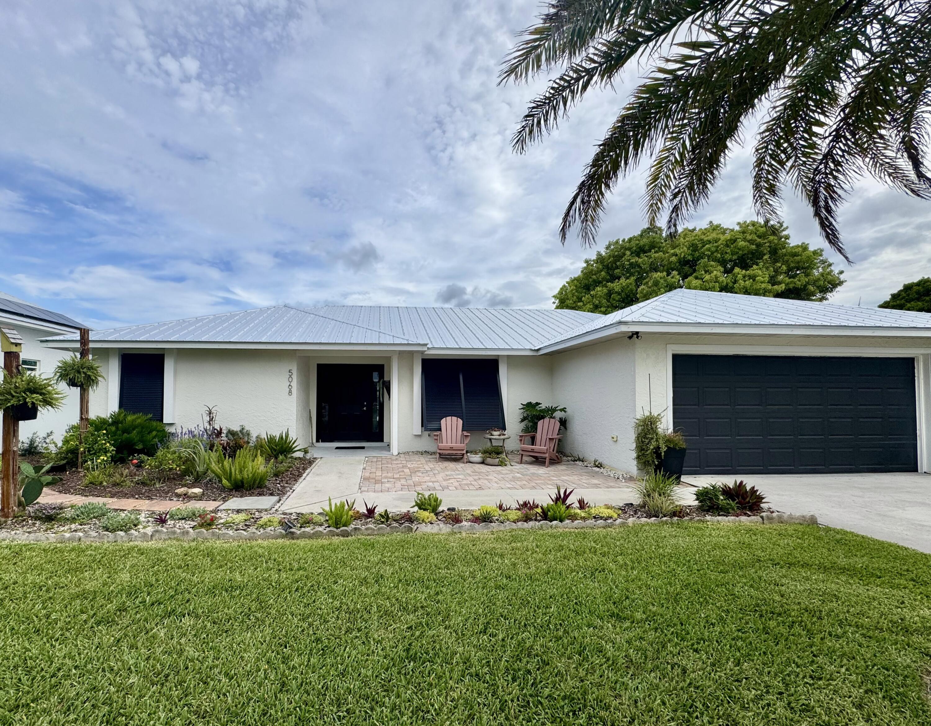 5068 Southeast Major Way Stuart, FL 34997 - Photo 2 of 2 5068 Front