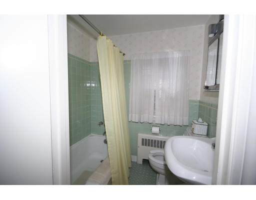 21 Whitney Road Newton, MA 02460 - Photo 9 of 14 a bathroom with a sink and toilet