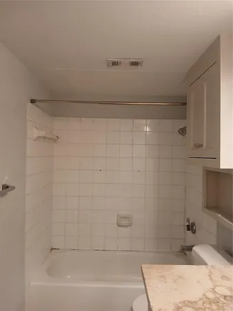 a bathroom with a bathtub