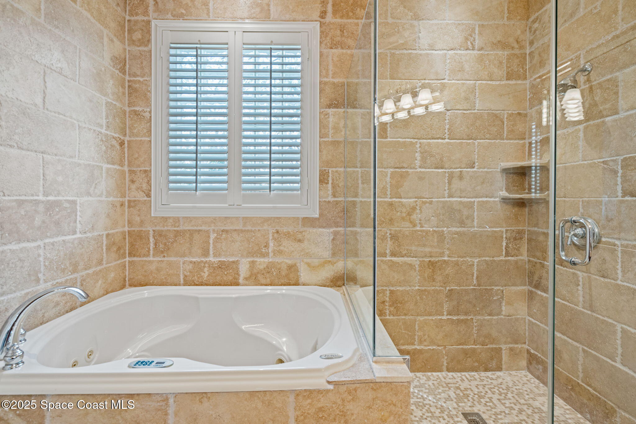 1835 Harbor Point Drive Merritt Island, FL 32952 - Photo 15 of 67 a white bath tub and a shower