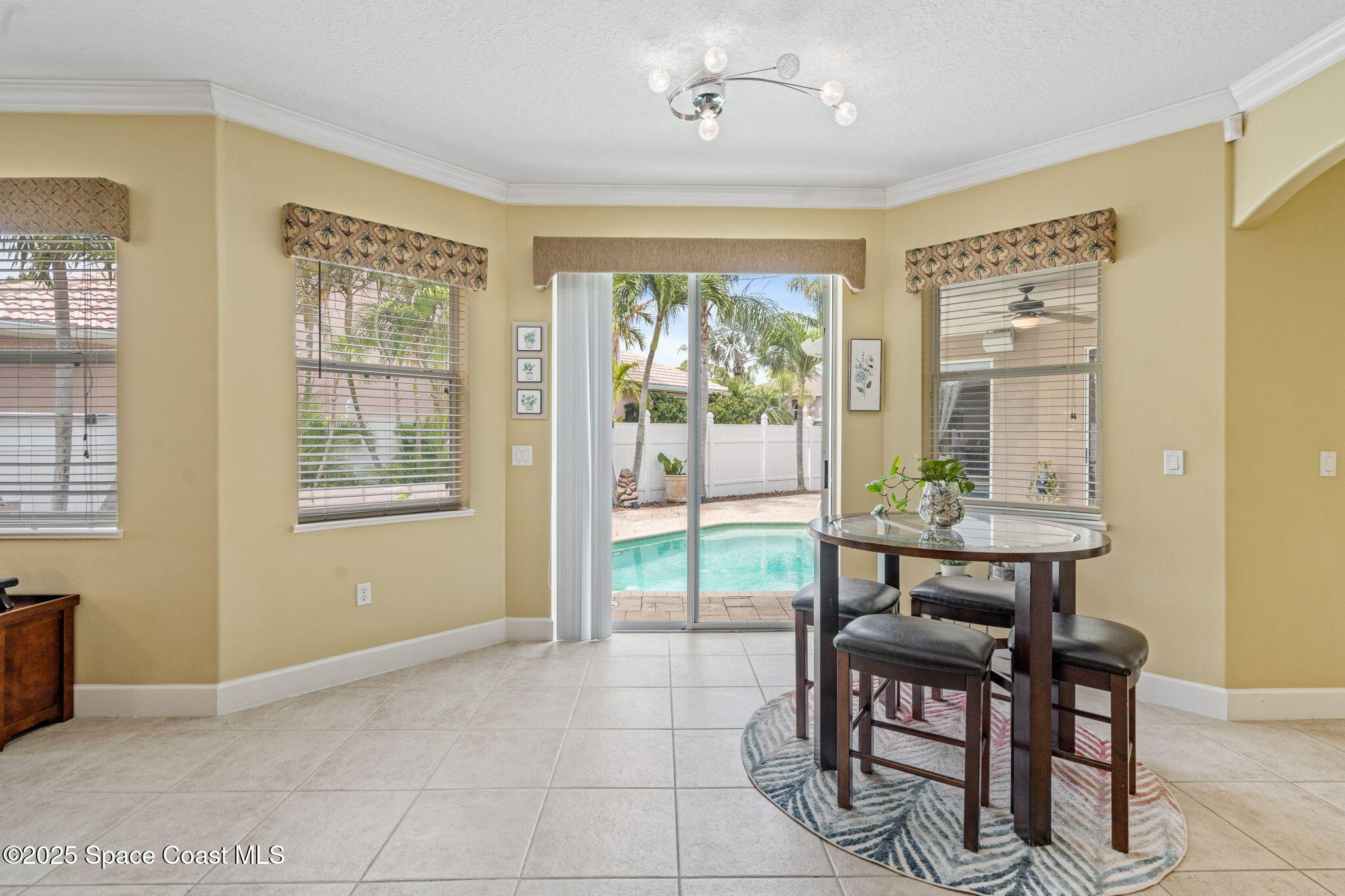 1835 Harbor Point Drive Merritt Island, FL 32952 - Photo 26 of 67 a view of a dining room with furniture window and outside view