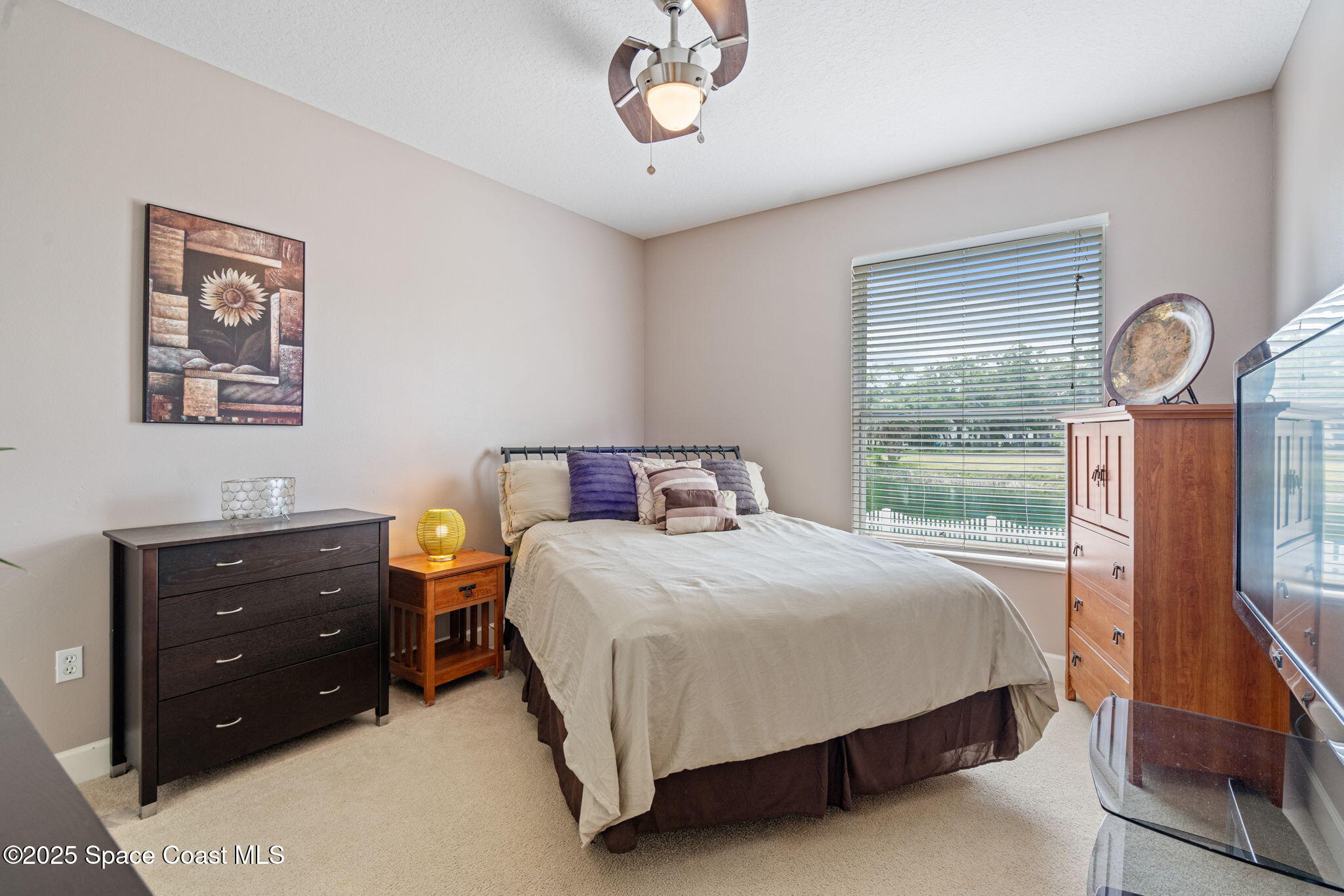 1835 Harbor Point Drive Merritt Island, FL 32952 - Photo 45 of 67 a bedroom with a bed and a window